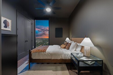 Bedroom featuring wood finished floors and a ceil