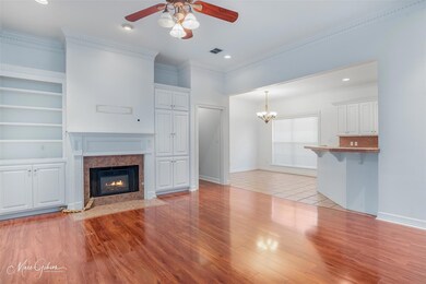 Unfurnished living room featuring light hardwood /