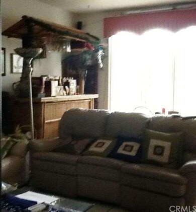 A DIFFERENT VIEW OF FAMILY ROOM W/DOUBLE GLASS DOO
