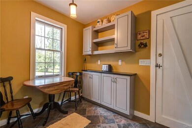Casual in-kitchen dining is light and bright with 