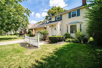 View of front property featuring a front lawn