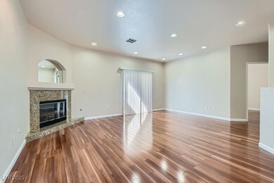 Unfurnished living room with wood finished floors,