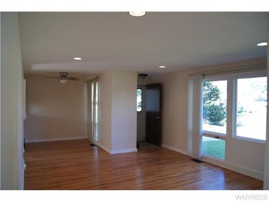 Living Room. Nice entrance area with the closet.  