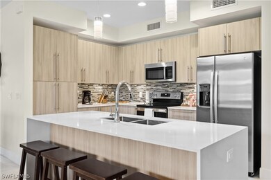 Kitchen featuring appliances with stainless steel