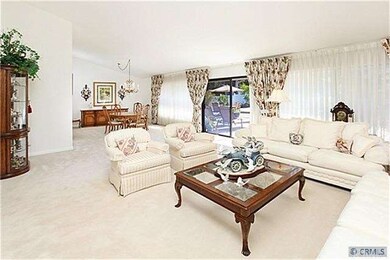 Living room with access to the back yard.