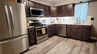 Remodeled kitchen with stainless steel appliances