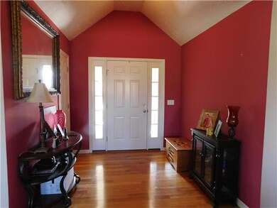 Gorgeous entry foyer with hardwood floors