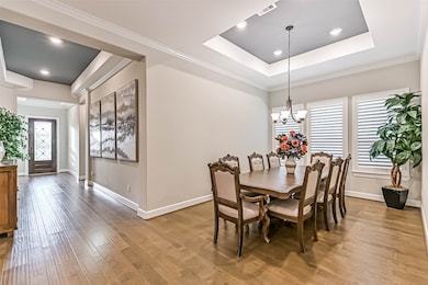 The dining area offers a warm and inviting space p