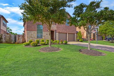 This home has a basketball goal installed which will make for some fun games or practice.