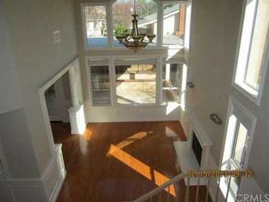 Living Room showing Vaulted Ceiling, Fireplace & C