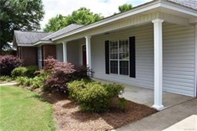 Covered front porch that is welcoming.