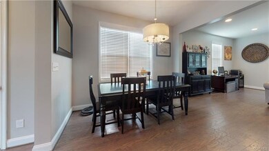 Dining room view from kitchen into family room