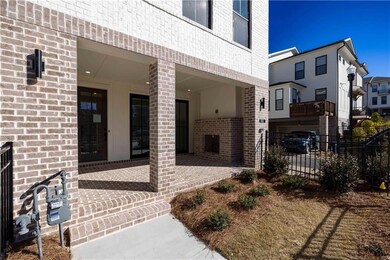 Large corner covered terrace overlooking fenced front yard