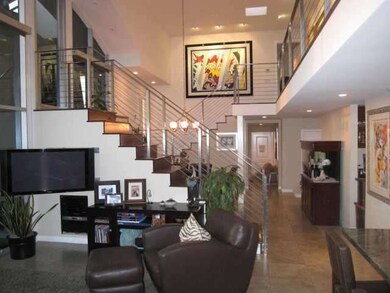 View from the Kitchen.  Middle stairs lead to the 