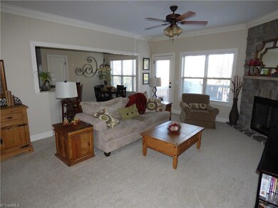 Very open floor concept with a sneak peak view of the breakfast room and kitchen.