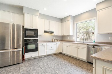 nice & bright kitchen with recessed lighting
