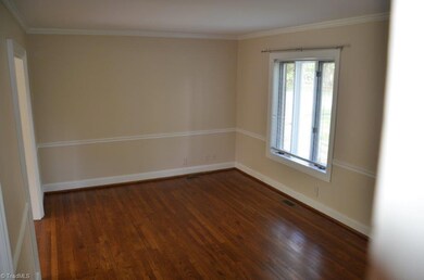 Another view of the living room. Entry to dining is to the left.
