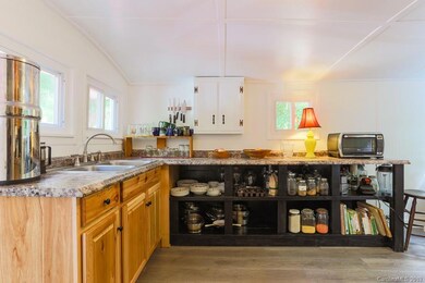 Recent updates and open shelving in kitchen