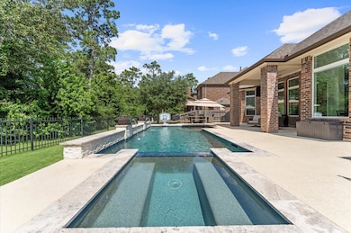 NO back neighbors.  Stone back water fall wall wit