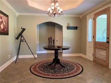 Foyer with Decorative Tray Ceiling