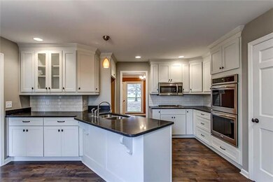 All New Kitchen w/Granite Countertops, Double Convection Ovens, New Cabinets w/Soft-Close Drawers.