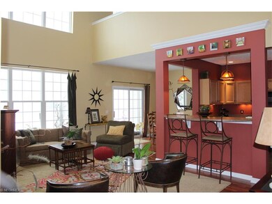 Two story ceilings with open concept through out. 