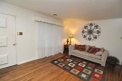 Step inside the living room and be greeted by glea