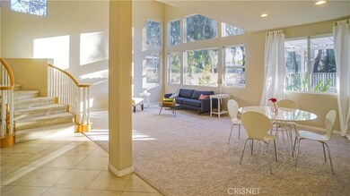 Coming from kitchen area into formal dining and living room