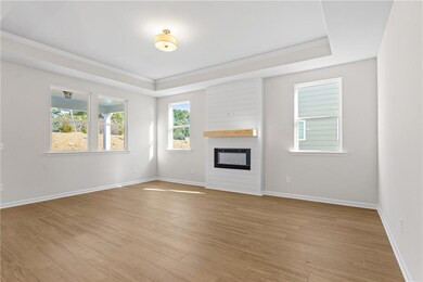 Unfurnished living room featuring ornamental moldi