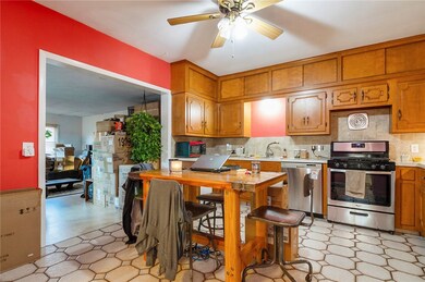 Updated eat-in kitchen has stainless appliances, d
