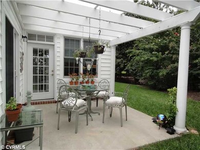 Exterior Front - Private Patio with Pergola