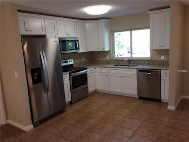Features New Wood Shaker Cabinetry, New Stainless 