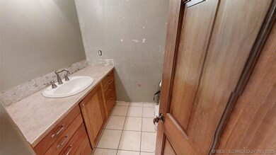 This first bathroom offers a shower
