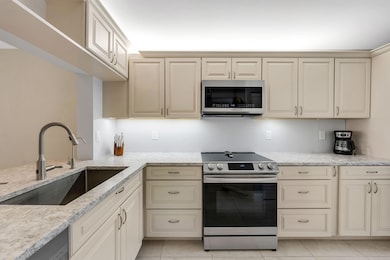 236 Pebble Beach Cir unit 102, Naples, FL 34113 - photo 5