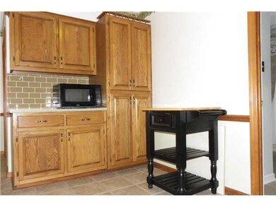 Pantry w/sliders.Pot & pan storage.Rolling Island