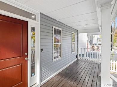 Covered front porch lounging awaits you.