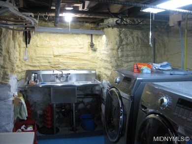 Utility sink in basement.