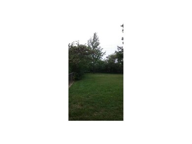 fully fenced 1/2 acre corner lot