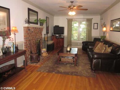 Den/Family/Great Room - Prestine hardwoods, a bric