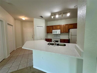 6149 Metrowest Blvd unit 107, Orlando, FL 32835 - photo 2