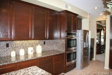 Kitchen has Granite counter tops AND upgraded appl