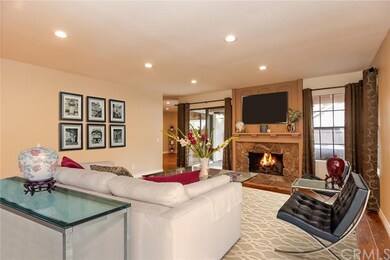 Spacious living room with warm fire place. (Virtua