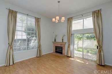 A fireplace is situated in the corner for optional