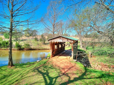 Beautiful stocked pond with wooden bridge