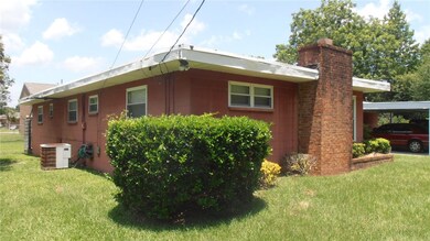 CUSTOM BUILT ALL CINDER BLOCK ONE STORY. BRICK ACC