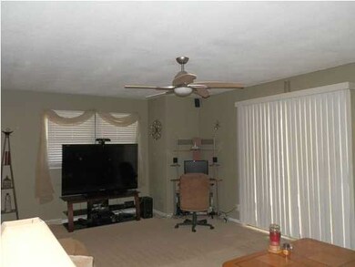 2nd view of living room with sliding glass doors o