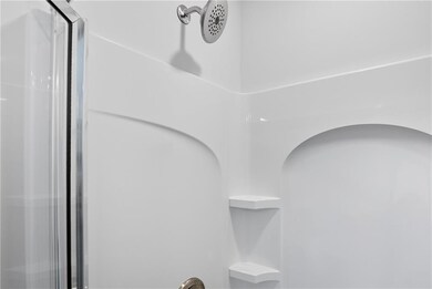 Bathroom view of a shower stall