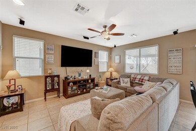 The living room is open an spacious with surround