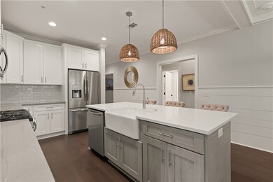 Farmhouse sink and plenty of counter and cabinet s