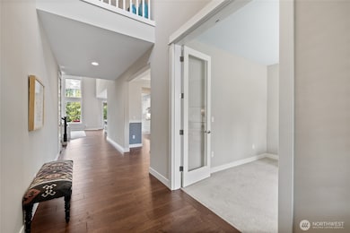 Above entry is a 2nd Level balcony which is 2-sided:  Overlooks entry on one side and Great Room on the other